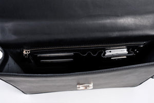 This Italian leather single-gusset, key-locking briefcase is made with perfection in every detail. Handmade in Italy by Borlino of the finest Italian vegetable-tanned leathers and metals. Onyx Black Leathers.