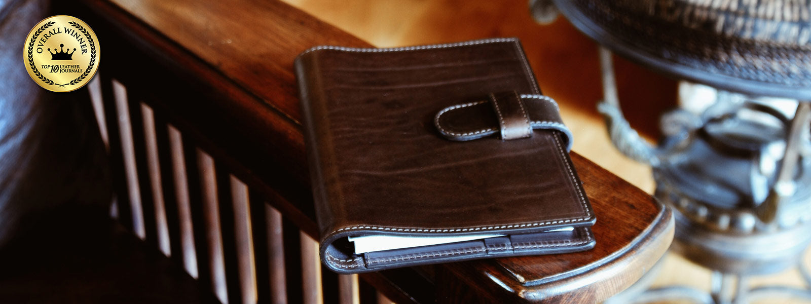Borlino Handmade Padfolio Handcrafted Tuscan leather journal with a buckle strap, an award-winning design exuding refined, timeless luxury.