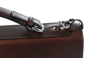 This strong leather double-gusset, key-locking briefcase is made with perfection in every detail. Handmade in Italy by Borlino of the finest Italian vegetable-tanned leathers and metals. Walnut Brown Leathers.