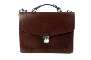 This strong leather double-gusset, key-locking briefcase is made with perfection in every detail. Handmade in Italy by Borlino of the finest Italian vegetable-tanned leathers and metals. Walnut Brown Leathers.