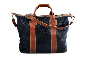 Leather Duffle - Hand-crafted of the finest Italian, vegetable-tanned Buffalo and Vachetta leathers, the Borlino Big Horn bag is great for a weekend getaway. It’s loaded with features and pockets inside and out. Easy to over pack. Borlino Italy. Onyx-Terra Tan.