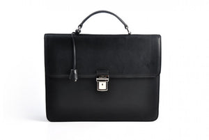 This Italian leather single-gusset, key-locking briefcase is made with perfection in every detail. Handmade in Italy by Borlino of the finest Italian vegetable-tanned leathers and metals. Onyx Black Leathers.