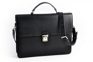 This Italian leather single-gusset, key-locking briefcase is made with perfection in every detail. Handmade in Italy by Borlino of the finest Italian vegetable-tanned leathers and metals. Onyx Black Leathers.