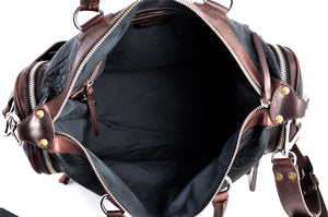 This Leather duffel bag is constructed of the finest Italian Buffalo and Vachetta leathers. It's perfect for weekend trips that securely fits in the plane overhead or under your seat or a short trip to the gym. With 6 pockets inside and out, there's a place for everything. Borlino Onyx and Walnut. 