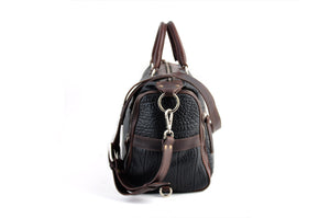 This Leather duffel bag is constructed of the finest Italian Buffalo and Vachetta leathers. It's perfect for weekend trips that securely fits in the plane overhead or under your seat or a short trip to the gym. With 6 pockets inside and out, there's a place for everything. Borlino Onyx and Walnut. 