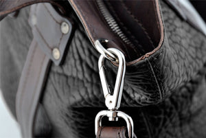 This Leather Buffalo Tote is constructed of the finest Italian vegetable-tanned Buffalo and Vachetta leathers. Each handmade tote is a one-of-a-kind. It is perfect for daily use, weekend trips or a carry-on travel bag that securely fits in the overhead or under your seat. 