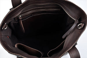 This Leather Buffalo Tote is constructed of the finest Italian vegetable-tanned Buffalo and Vachetta leathers. Each handmade tote is a one-of-a-kind. It is perfect for daily use, weekend trips or a carry-on travel bag that securely fits in the overhead or under your seat. 