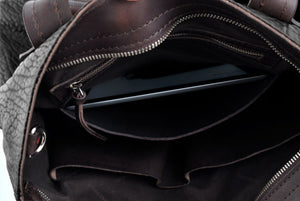 This Leather Buffalo Tote is constructed of the finest Italian vegetable-tanned Buffalo and Vachetta leathers. Each handmade tote is a one-of-a-kind. It is perfect for daily use, weekend trips or a carry-on travel bag that securely fits in the overhead or under your seat. 