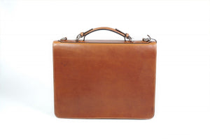 This strong leather double-gusset, key-locking briefcase is made with perfection in every detail. Handmade in Italy by Borlino of the finest Italian vegetable-tanned leathers and metals. Terra Tan Leathers.