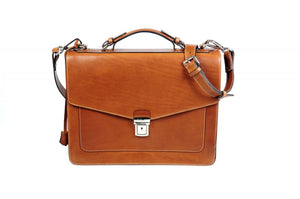 This strong leather double-gusset, key-locking briefcase is made with perfection in every detail. Handmade in Italy by Borlino of the finest Italian vegetable-tanned leathers and metals. Terra Tan Leathers.