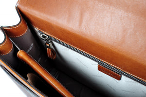 This strong leather double-gusset, key-locking briefcase is made with perfection in every detail. Handmade in Italy by Borlino of the finest Italian vegetable-tanned leathers and metals. Terra Tan Leathers.