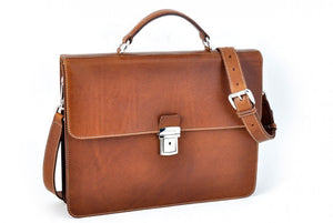 This Italian leather single-gusset, key-locking briefcase is made with perfection in every detail. Handmade in Italy by Borlino of the finest Italian vegetable-tanned leathers and metals. Terra Tan Leathers.