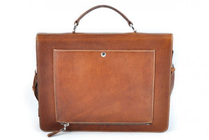 This Italian leather single-gusset, key-locking briefcase is made with perfection in every detail. Handmade in Italy by Borlino of the finest Italian vegetable-tanned leathers and metals. Terra Tan Leathers.