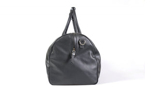 Leather Duffel Bag - This lightweight hand-crafted leather duffel bag is constructed of the finest Italian soft calf leathers. It's perfect for weekend trips that securely fits in the plane overhead. Great for a short trip to the gym or country club as well. The spacious interior also has a secure zippered pocket. Shark Grey.