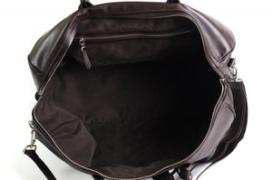 Leather Duffel Bag - This lightweight hand-crafted leather duffel bag is constructed of the finest Italian soft calf leathers. It's perfect for weekend trips that securely fits in the plane overhead. Great for a short trip to the gym or country club as well. The spacious interior also has a secure zippered pocket. Walnut Brown.