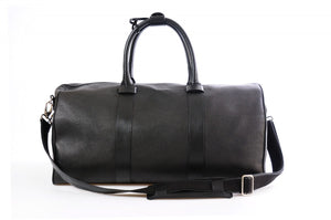 Leather Duffel - This lightweight hand-crafted leather duffel bag is constructed of the finest Italian soft calf leathers. It's perfect for weekend trips that securely fits in the plane overhead. Great for a short trip to the gym or country club as well. The spacious interior also has a secure zippered pocket.