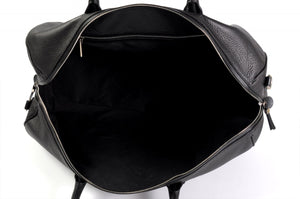 Leather Duffel - This lightweight hand-crafted leather duffel bag is constructed of the finest Italian soft calf leathers. It's perfect for weekend trips that securely fits in the plane overhead. Great for a short trip to the gym or country club as well. The spacious interior also has a secure zippered pocket.