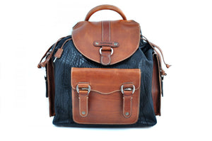 Buffalo Leather Backpack - We made the leather backpack to last for generations. It has all slide lock closures on the pockets and the top which even has a key-locking slide closure. Handmade of the finest Italian, vegetable-tanned Buffalo and Vachetta leathers, the Borlino Backpack is perfect for trips to the office or around the world. There are also additional pockets inside and a fast drawstring top all of leather.