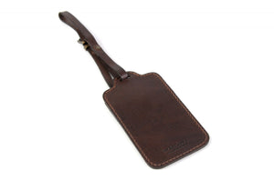 Etiqueta de equipaje de cuero marrón rústico